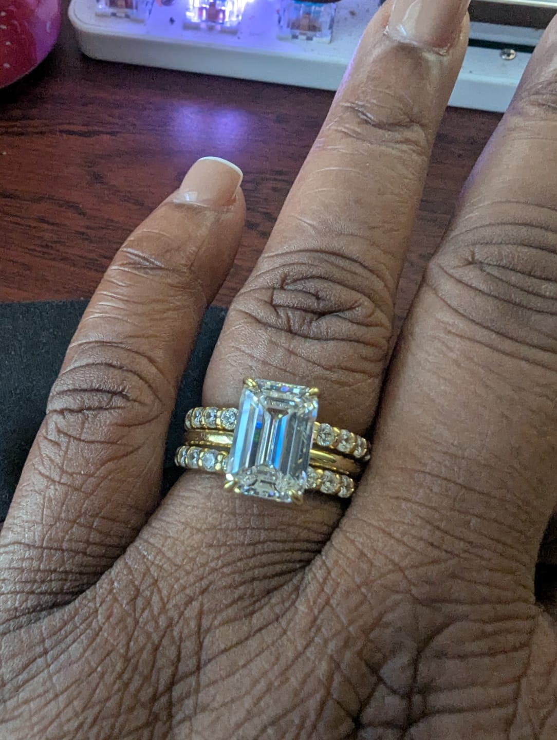 Customer photo review of 3PC 5.0Ct Emerald Cut Wedding Ring Set With Two Open Wedding Bands