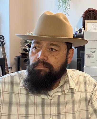 Reviewer wearing a fawn-colored Limited Edition USA 250th Anniversary Open Road Western Hat.