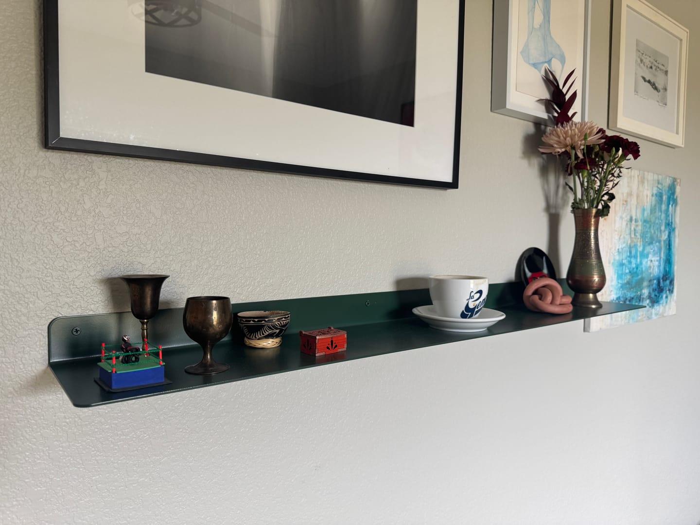 Customer photo review of Modern Metal Floating Shelf - Minimalist Wall Storage & Display