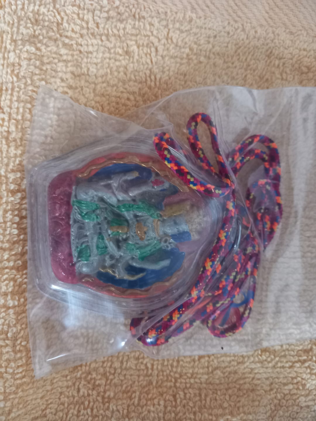 Customer photo review of Amulette Tsa Tsa de Namgyalma (avec pilule précieuse rilbu de Sa Sainteté le Dalaï Lama). # 212.1