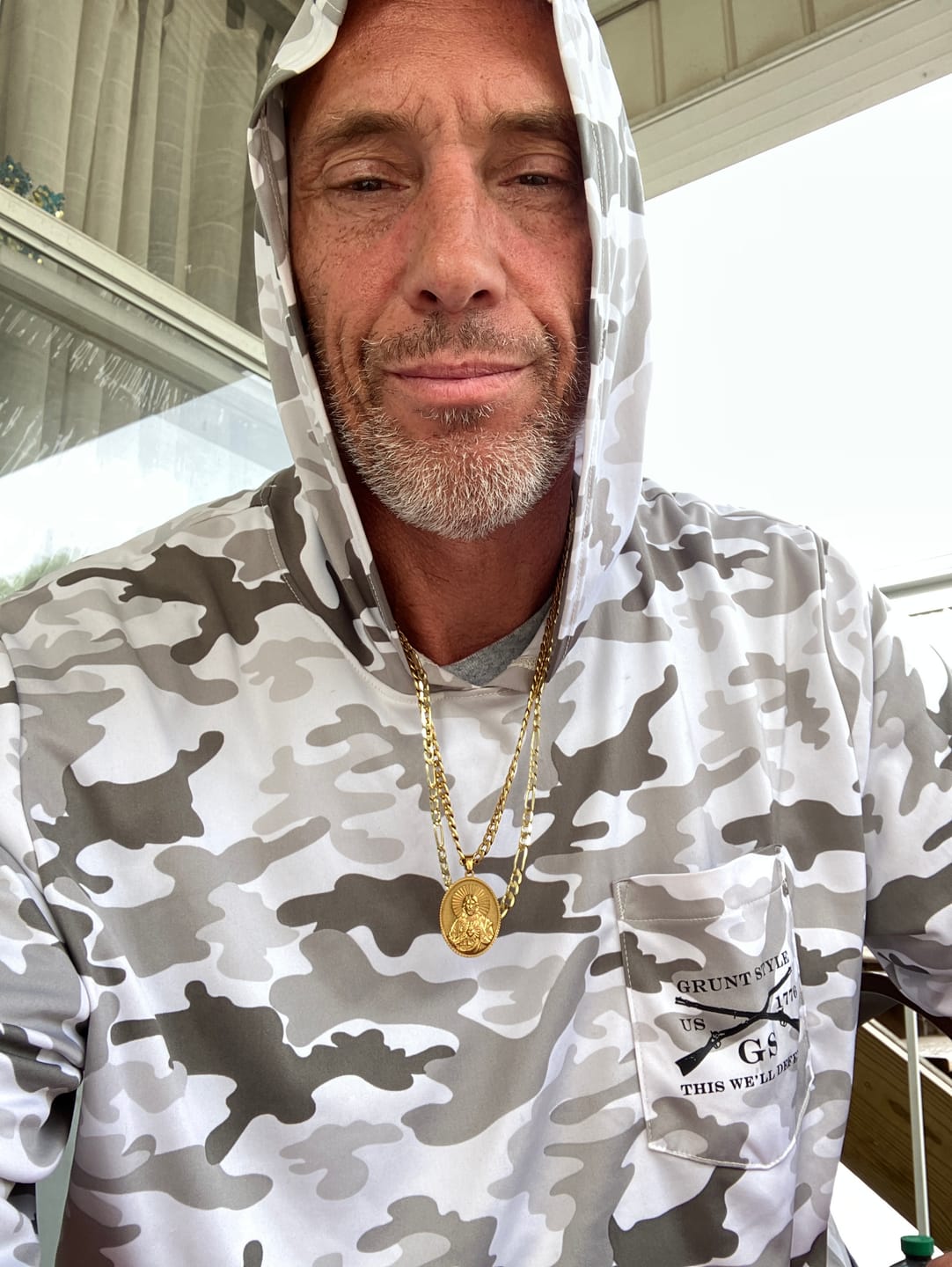 Customer photo review of FREE Today: Stainless Steel Sacred Heart Jesus Necklace with Cuban Link Chain: A Reminder of Devotion