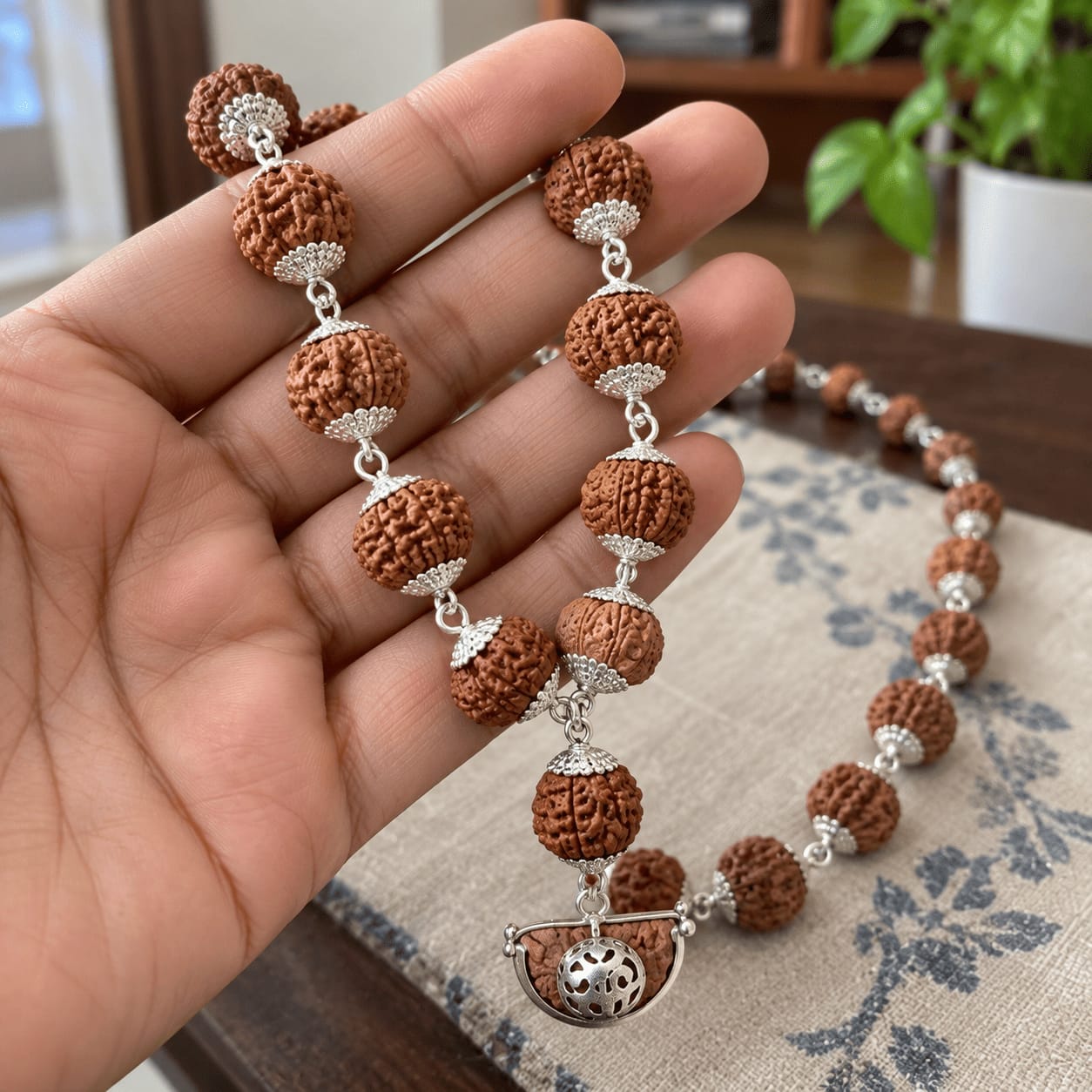 Customer photo review of 1-14 Mukhi Rudraksha Mala (Silver)