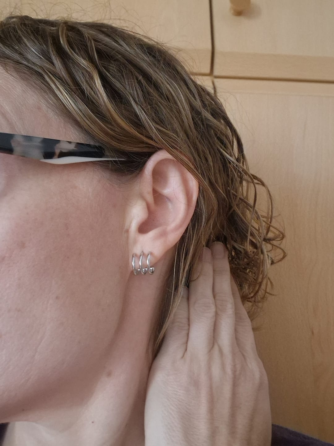 Customer photo review of Pendientes Semiaro Triple Arcos