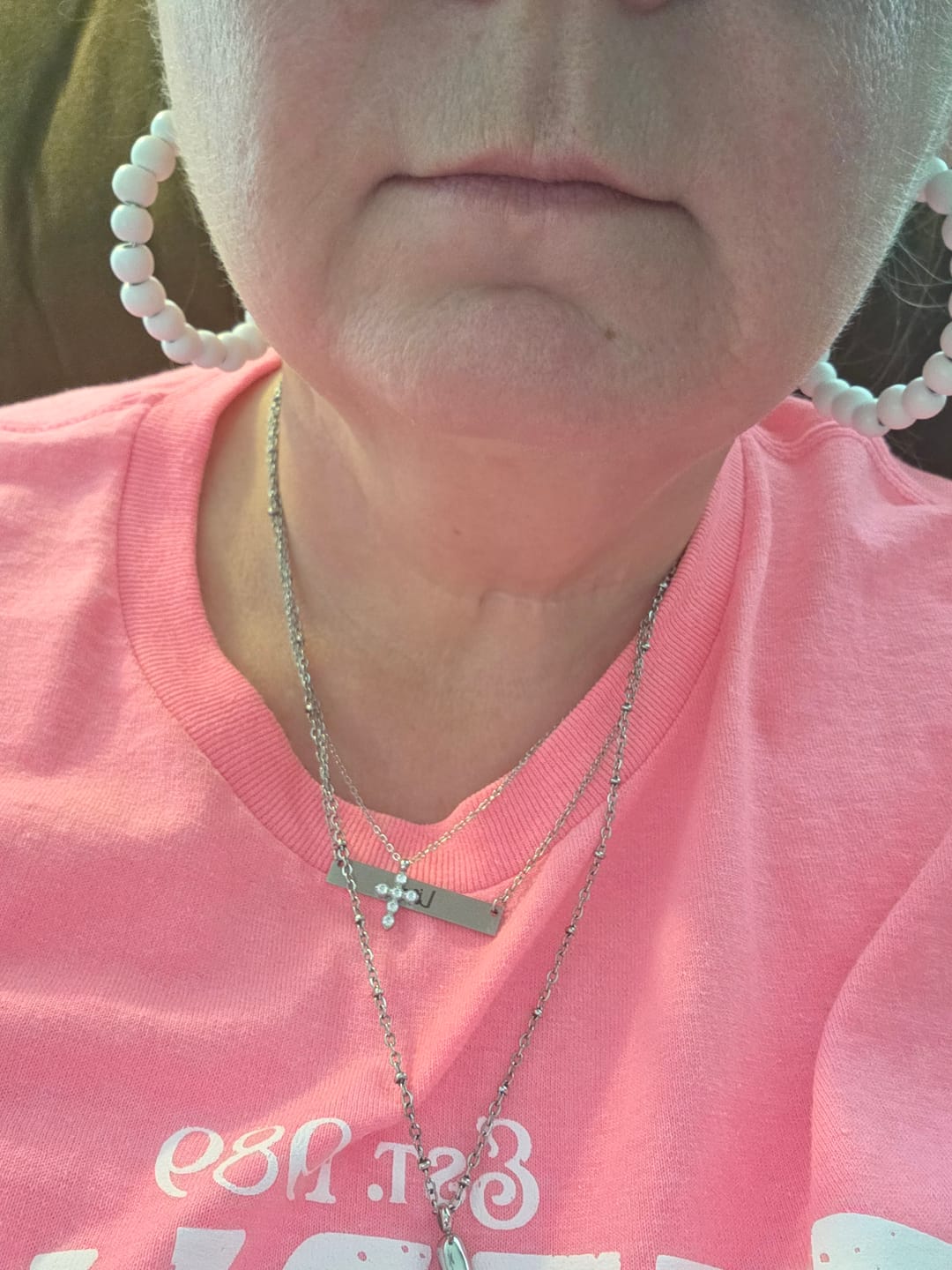Customer photo review of Cascade Cross Necklace