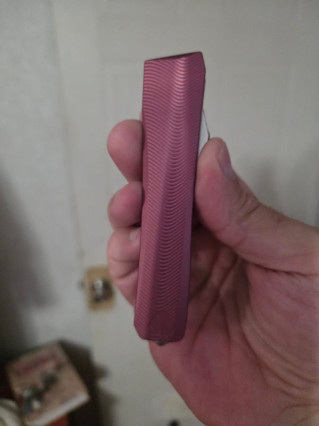 Customer photo review of Core Edge USA 0331 Pulsar OTF Auto Knife - Light Garnet Aluminum, 3.35" MagnaCut Drop Point, Single Edge - Made in USA (CE-0331-PULSAR-LTGAR-SE)