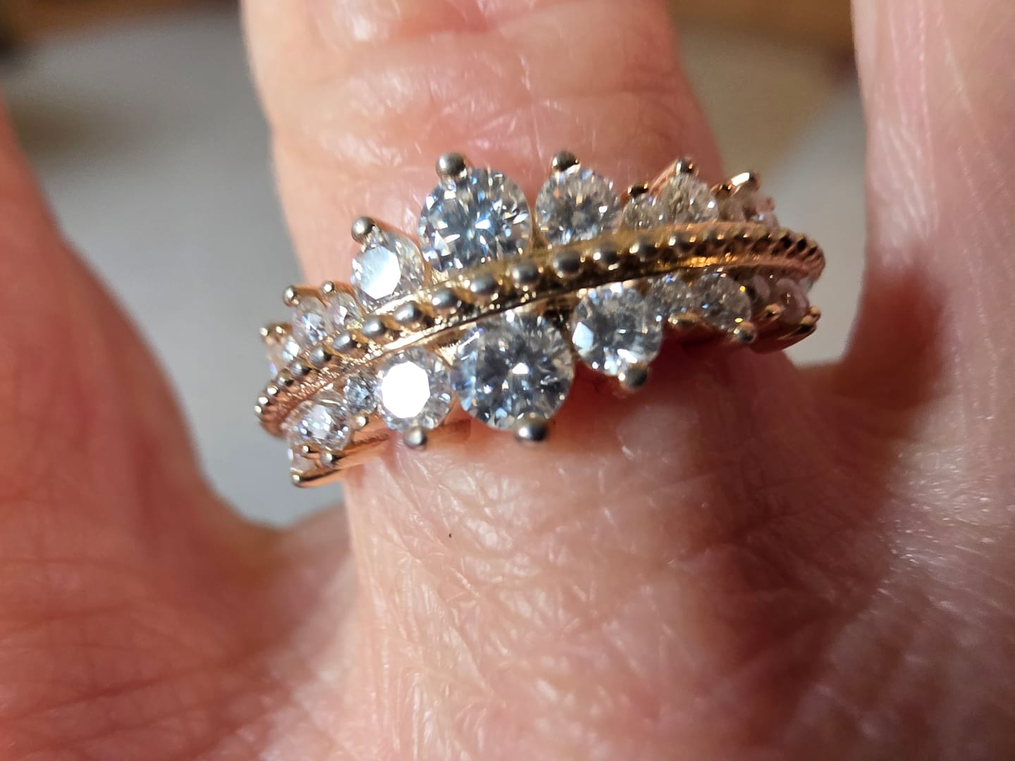 Customer photo review of Graduated Round Moissanite Milgrain Half Eternity Wedding Band Ring