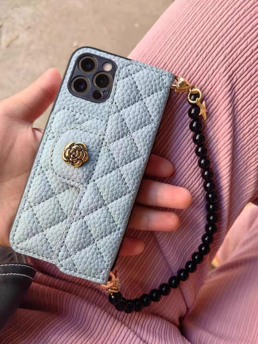 Customer photo review of Qumi Hakiki Deri Madeni Para Cüzdanlı Boyun Askılı iPhone Kılıfı