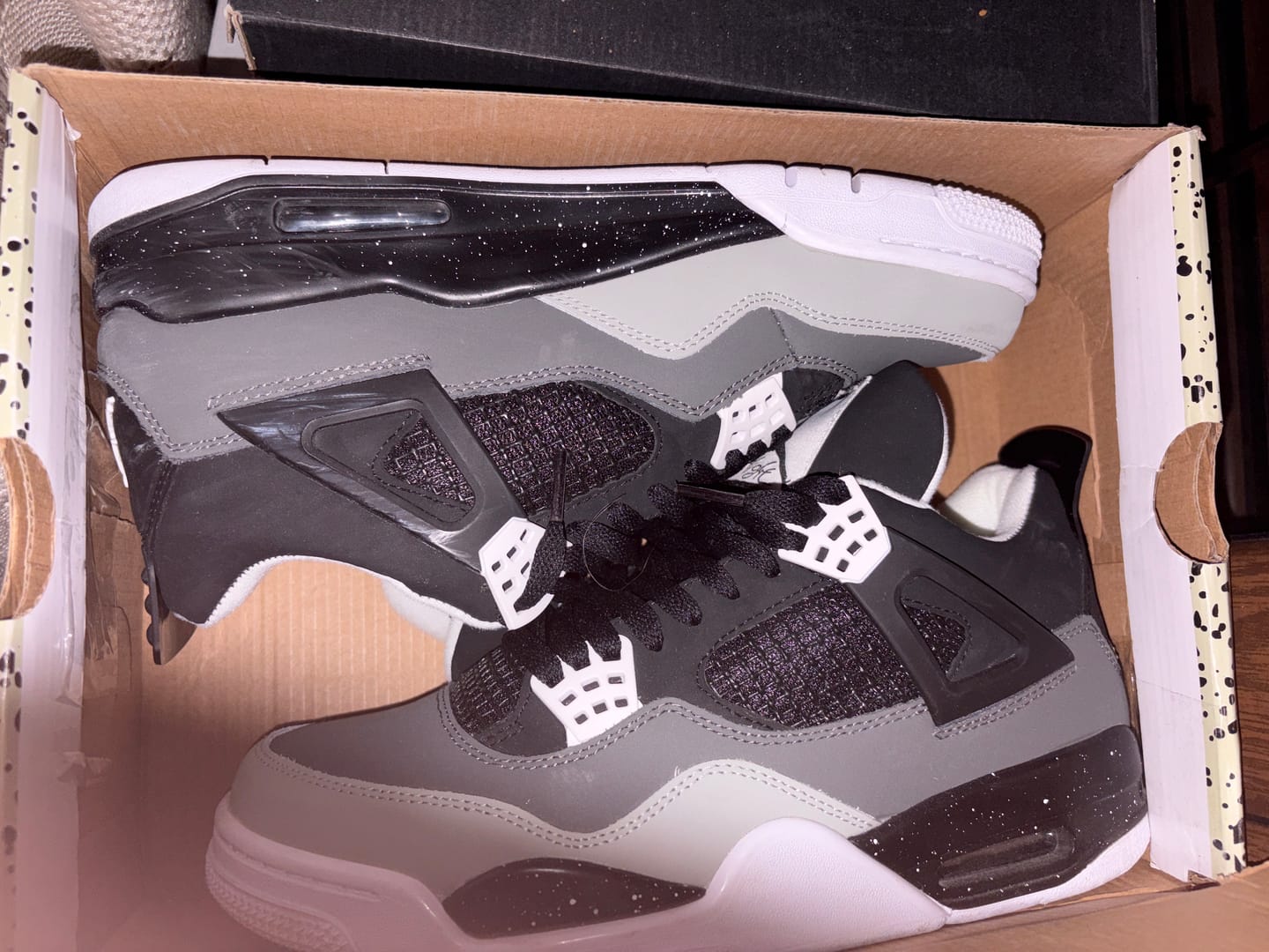 Customer photo review of Nike Air Jordan 4 Retro "Fear"