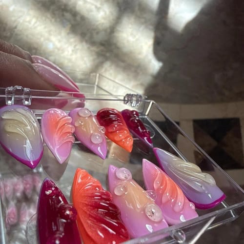 Customer photo review of Christmas Candy Cane Press On Nails by DoryNails Red Chrome Bow & Snowflake Nail Art Holiday Party Nails Gift for Her