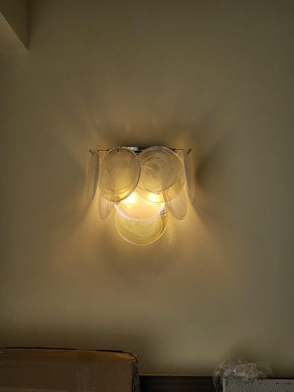 Customer photo review of Swirled Glass Disc Wall Light, Wall Sconce, Nickel, Hardwired