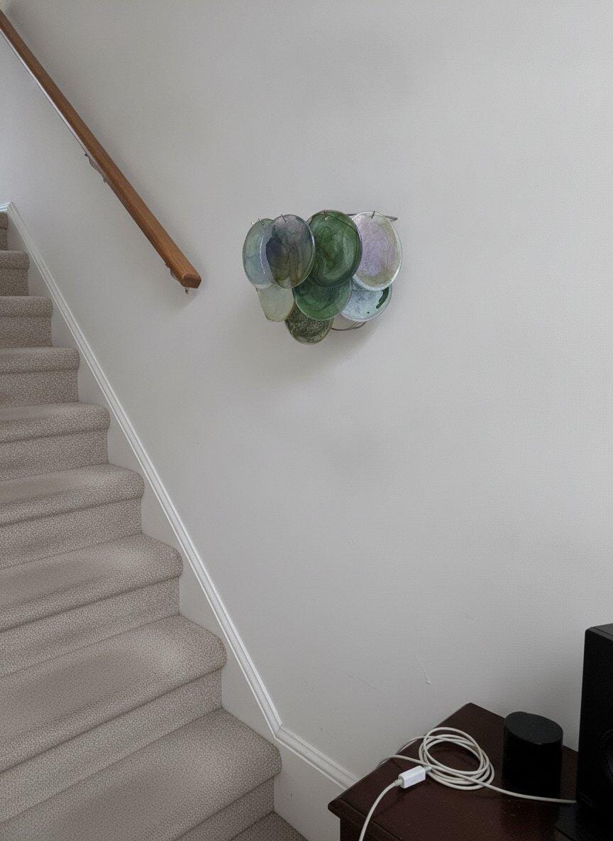 Customer photo review of Swirled Glass Disc Wall Light, Wall Sconce, Nickel, Hardwired