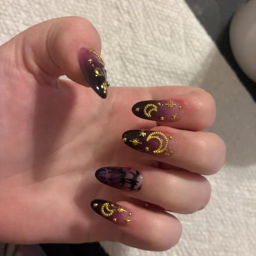 Customer photo review of Black Chrome Liquid Metal Almond Press-On Nails