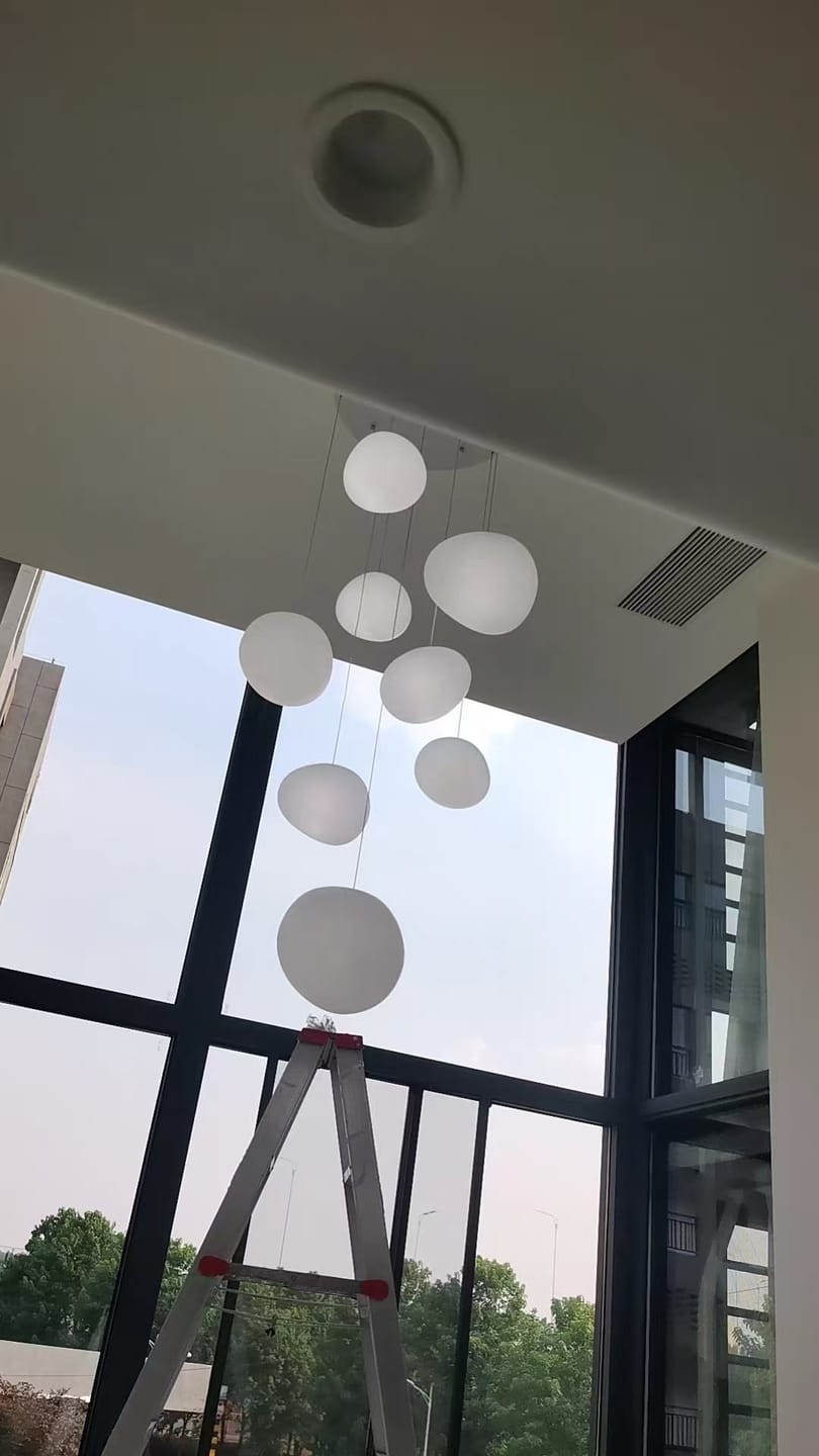 Customer photo review of Nordic Minimalist Stone-Looking Hanging Lights for Staircase