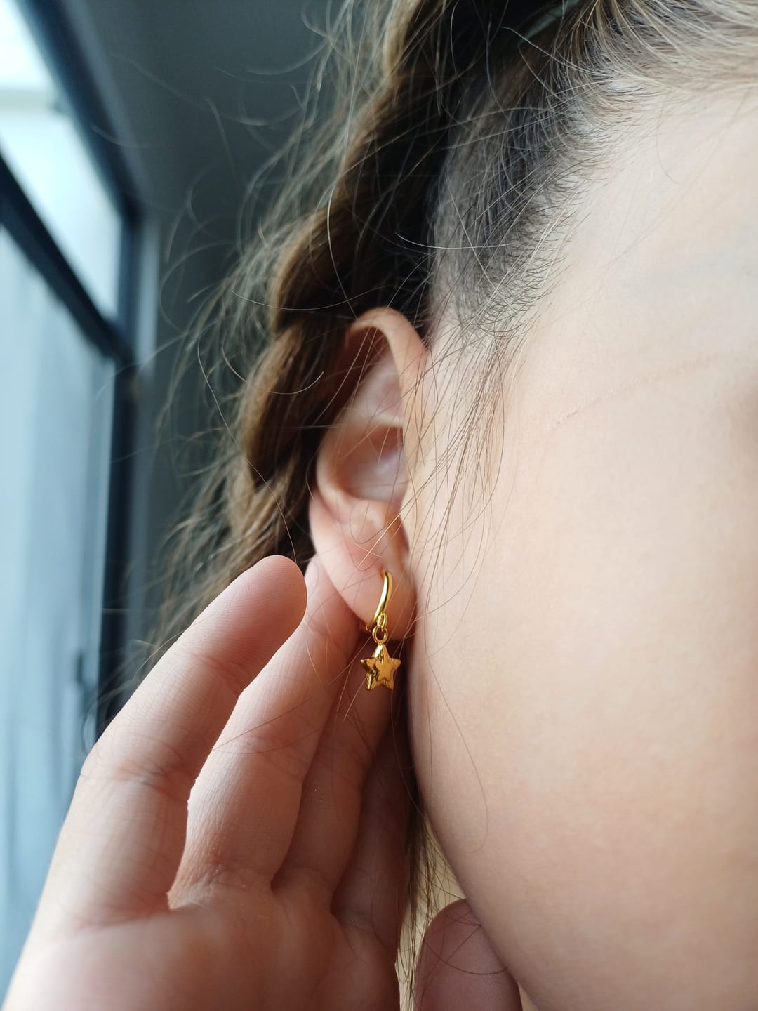 Customer photo review of Par Arracada Con Estrella 20 mm