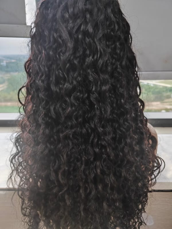 Customer photo review of Wavymy Pre-Bleached HD Lace Wear & Go Pre-Cut Wigs Dome Cap Glueless Water Wave 7x5 Lace Closure Wig 180% Density