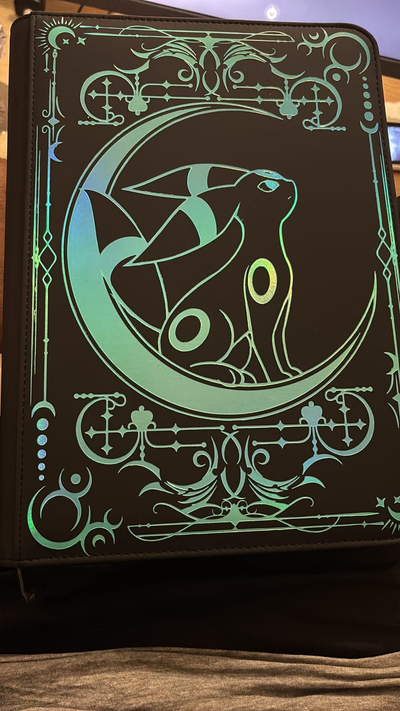 Customer photo review of Lunar Shadow Shiny 9-Pocket Trading Card Binder