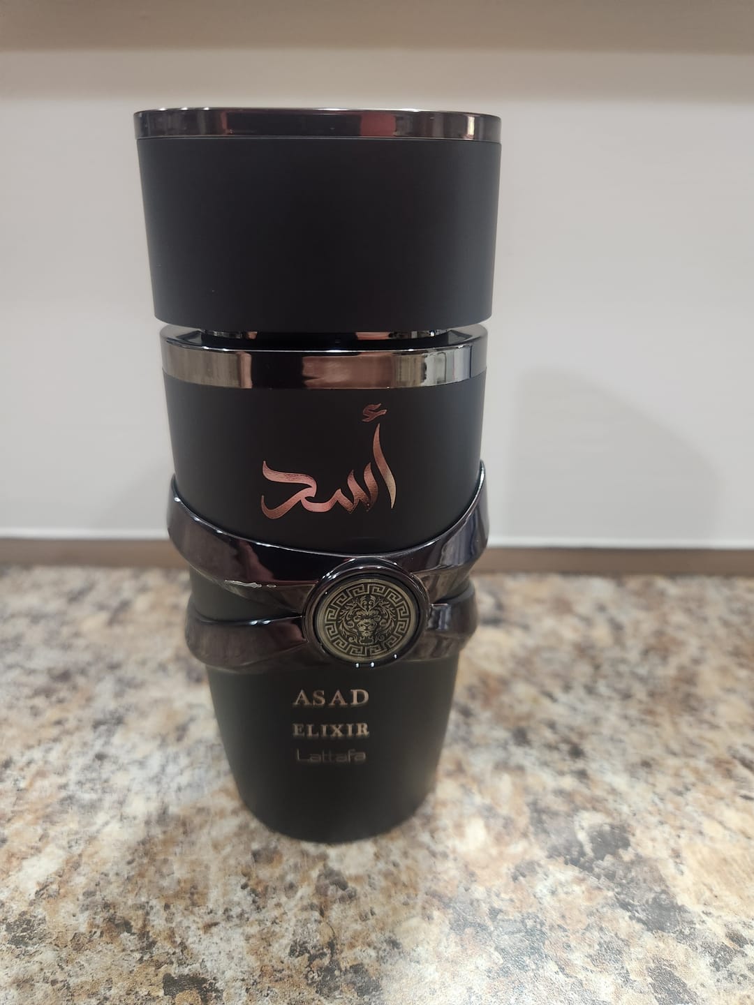 Customer photo review of Lattafa Asad Elixir Eau de Parfum 3.4 oz for Men