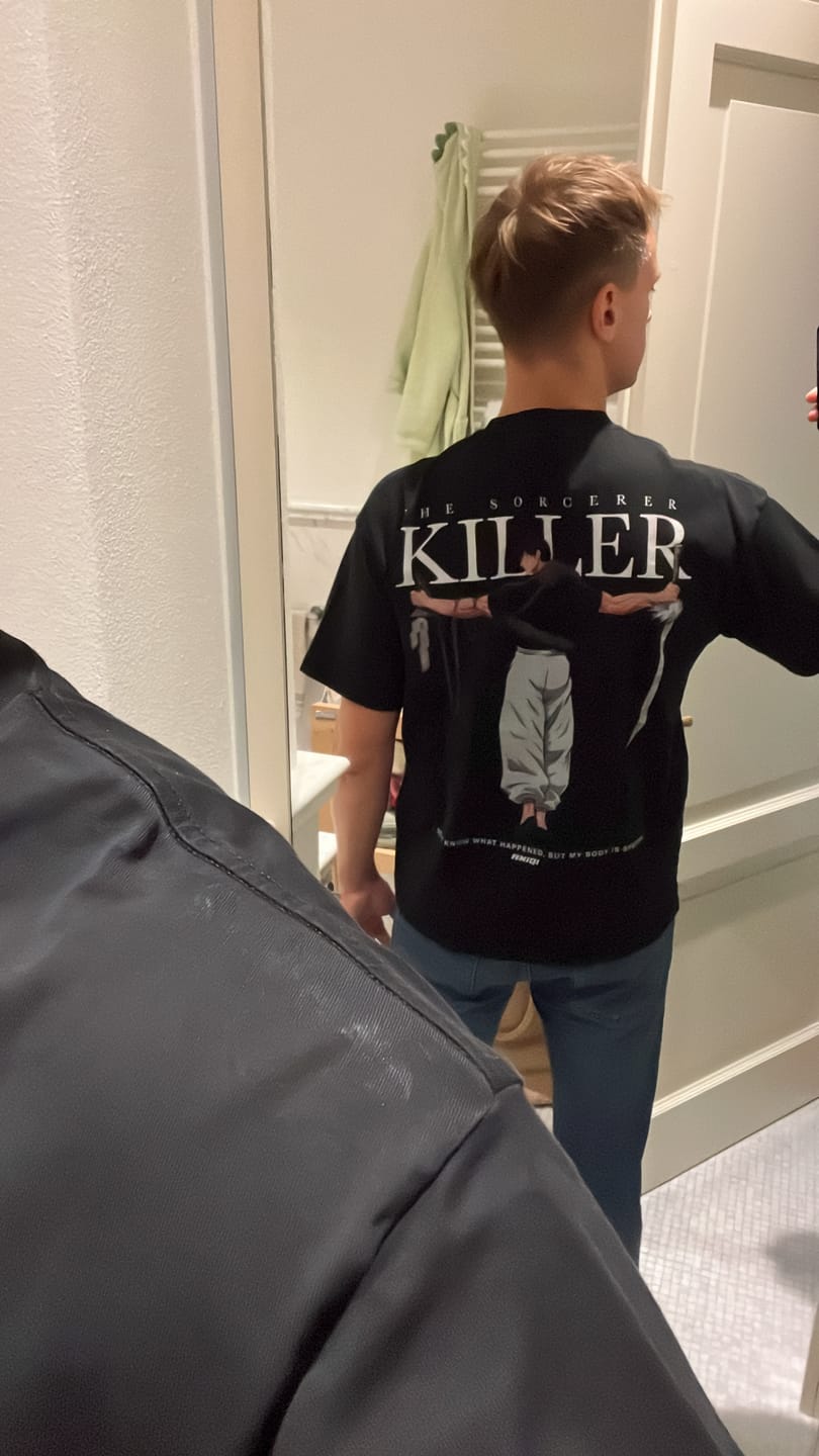 Customer photo review of TOJI TEE