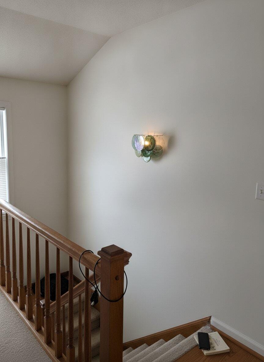Customer photo review of Swirled Glass Disc Wall Light, Wall Sconce, Nickel, Hardwired