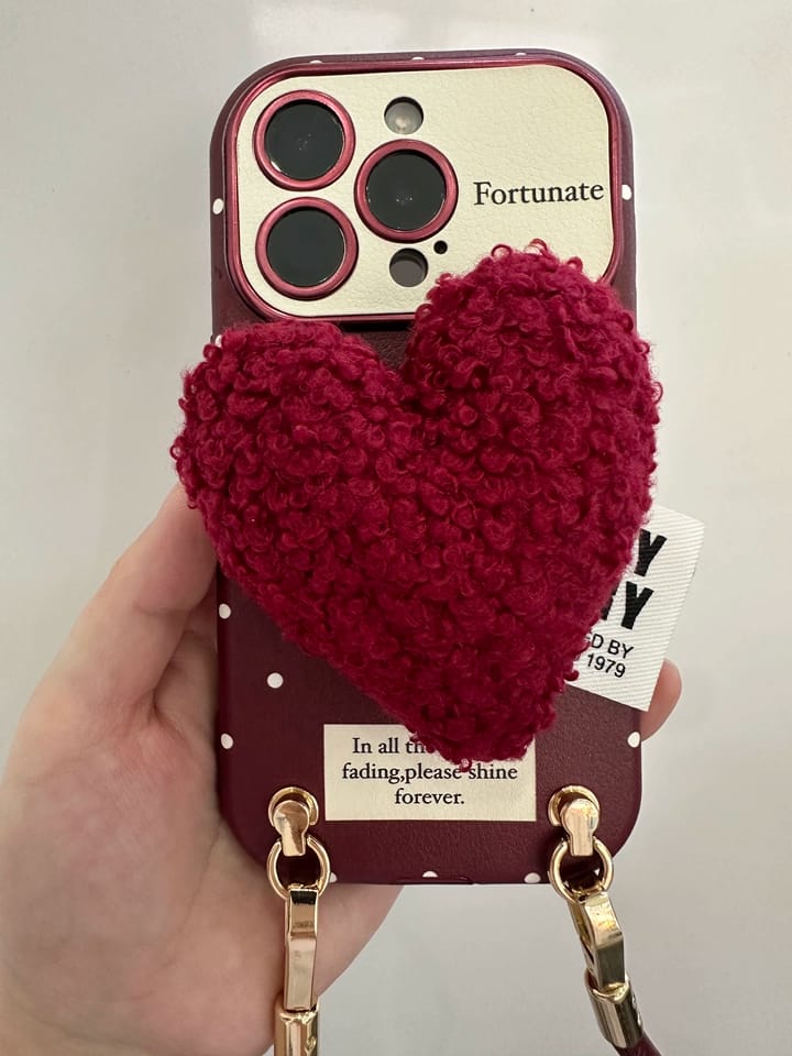 Customer photo review of Kırmızı Puantiyeli Peluş Kalpli Askılı Koruyucu iPhone Kılıfı