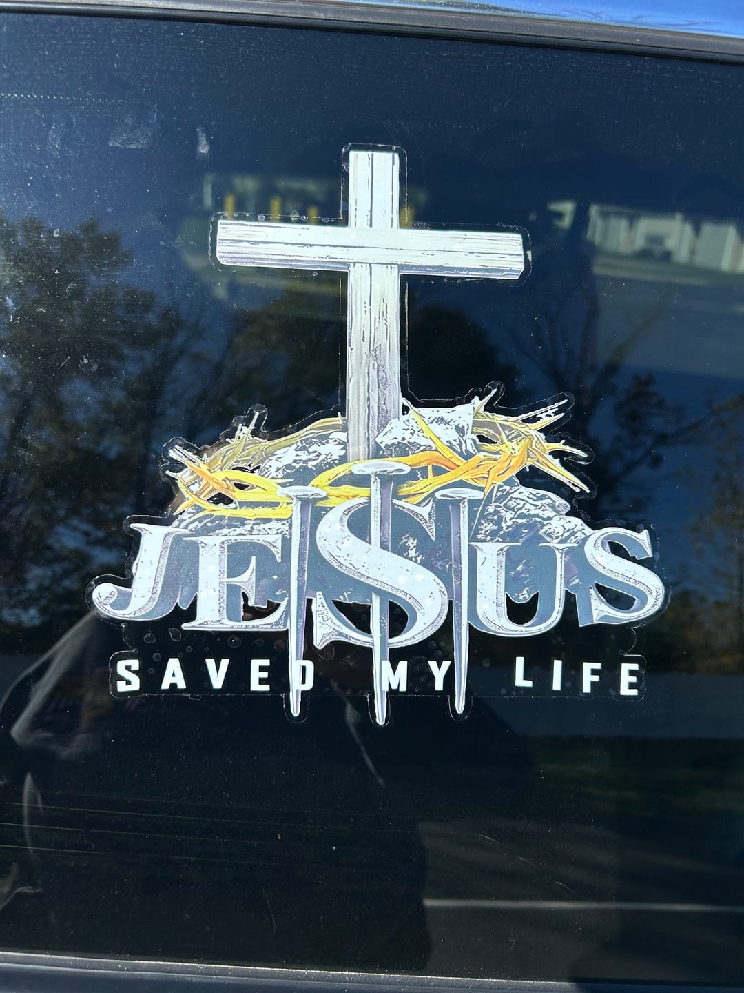 Customer photo review of Christianartworkshop Cross Crown of Thorns Nails JESUS SAVED MY LIFE Waterproof Car Sticker: A Symbol of Redemptive Sacrifice
