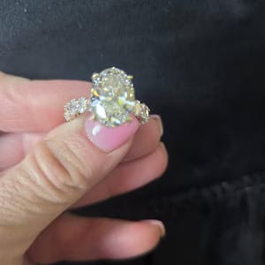 Customer photo review of 5 CT Oval Cut Lab Grown Diamond Hidden Halo Tulip Engagement Ring