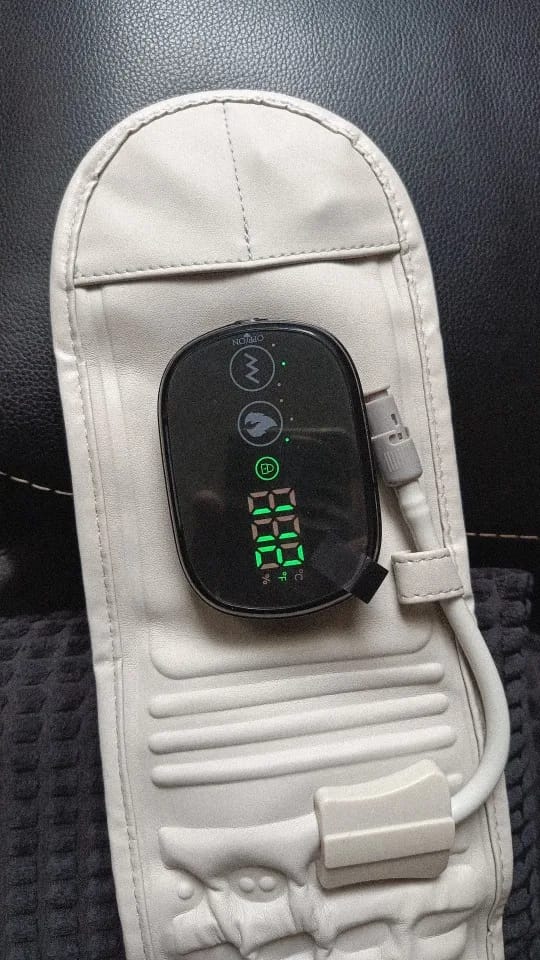 Customer photo review of Fascia Riscaldante Massaggiante Lombare DolorOff