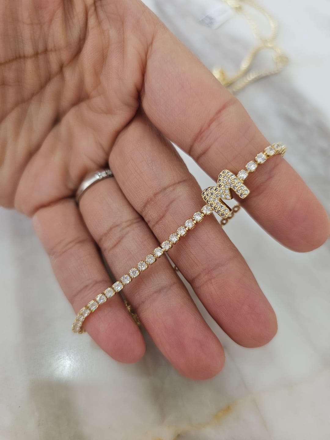 Customer photo review of Pulsera Zirconias Con Inicial Mini Bubble