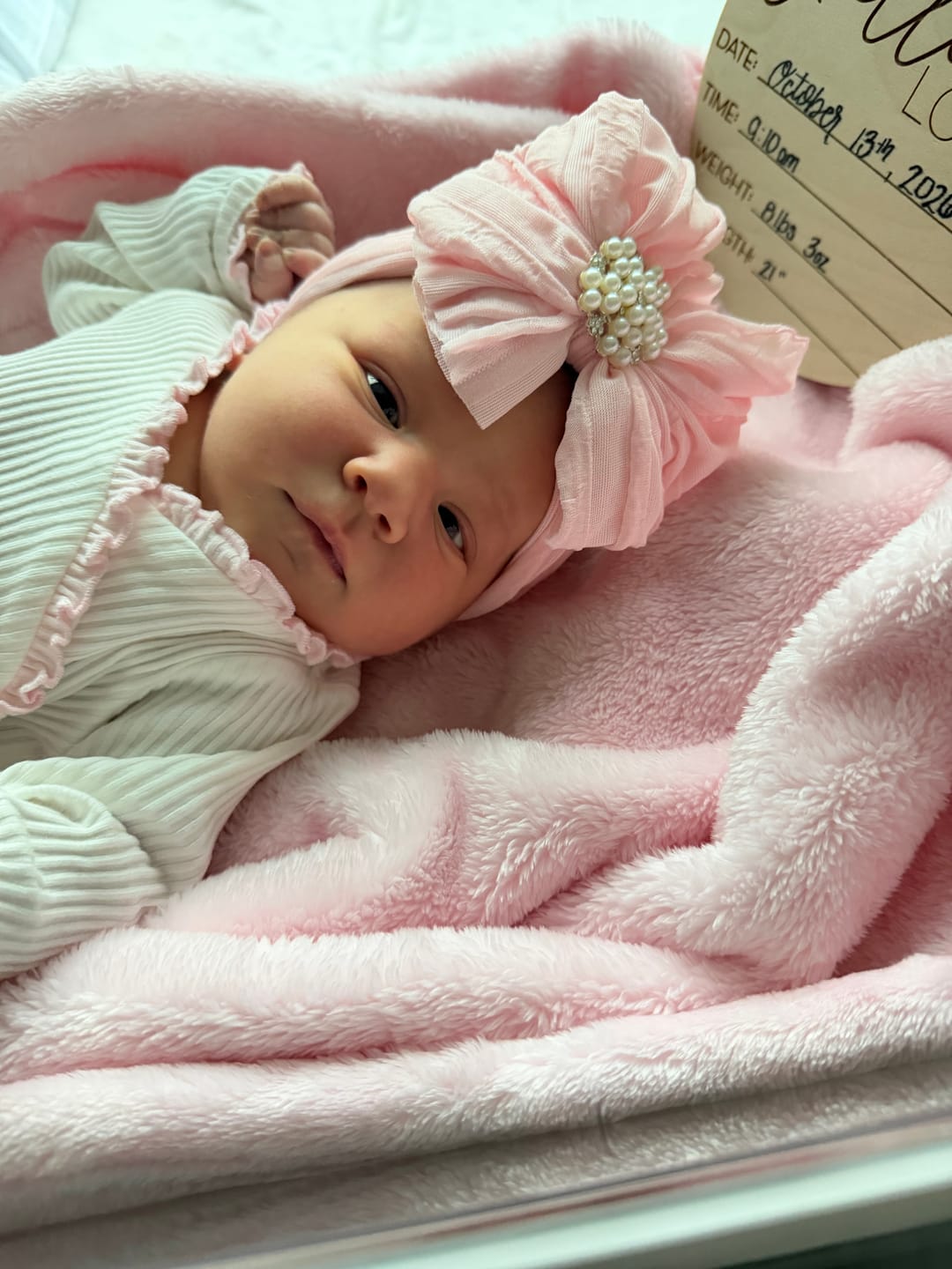 Customer photo review of Pearl Embellished Signature Ruffled Baby Headband