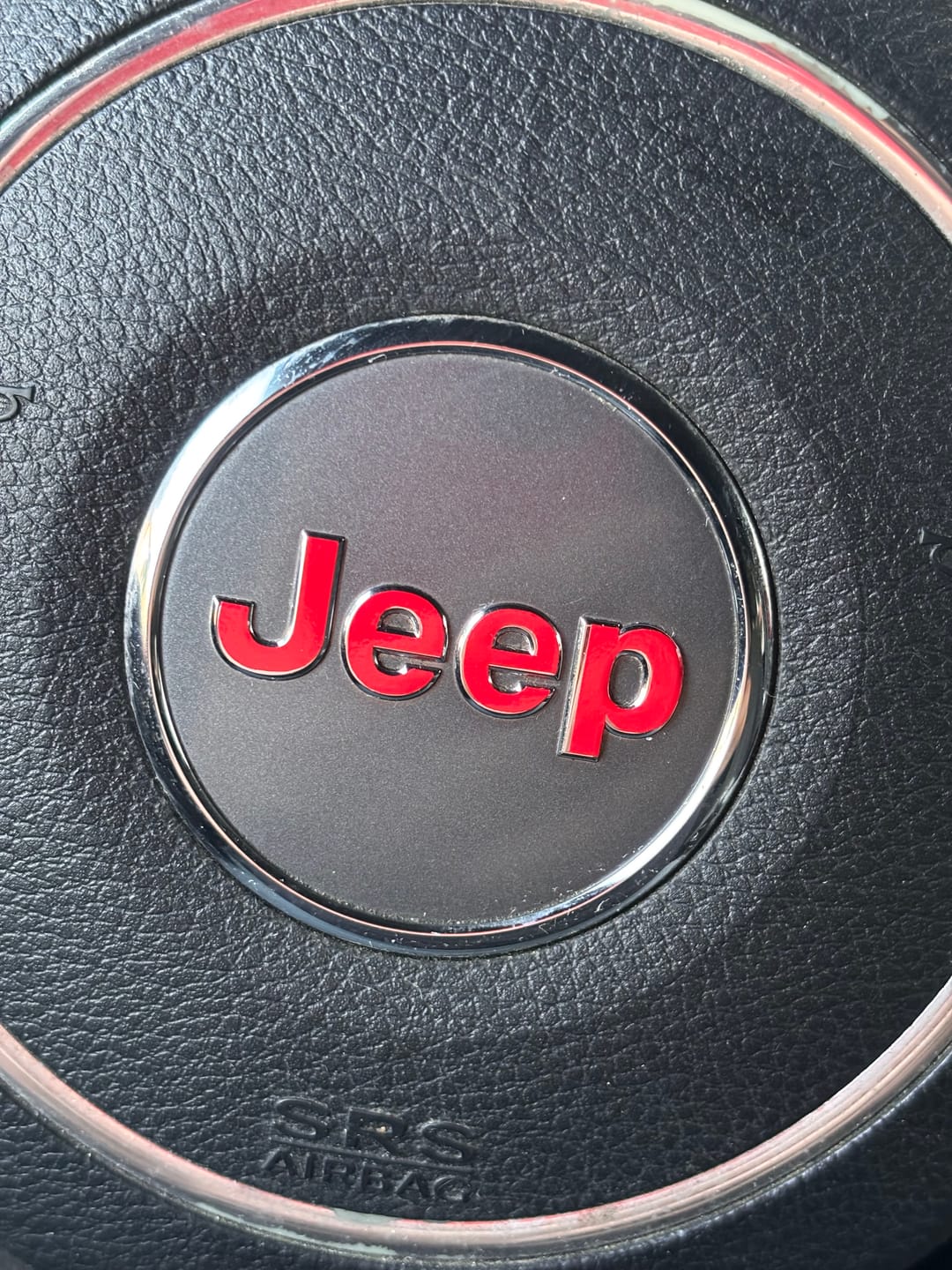 Customer photo review of JEEP Steering Wheel Emblem Overlay Decal — 30+ Colors & Designs (Flag, Topo, Animal, Solid)