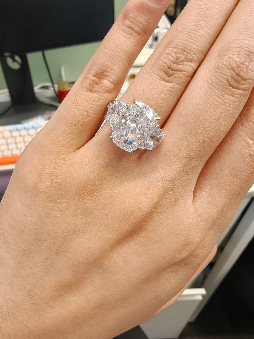 Customer photo review of 6.0 Ct Elongated Cushion Cut Simulated Diamond Three-Stone Travel Engagement Ring in S925 Sterling Silver