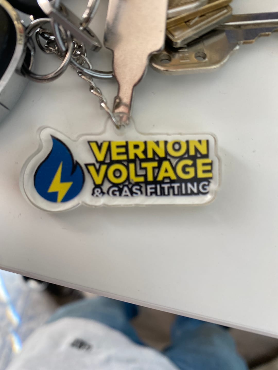 Customer photo review of 3 Tabletop Signs + 10 Keychains