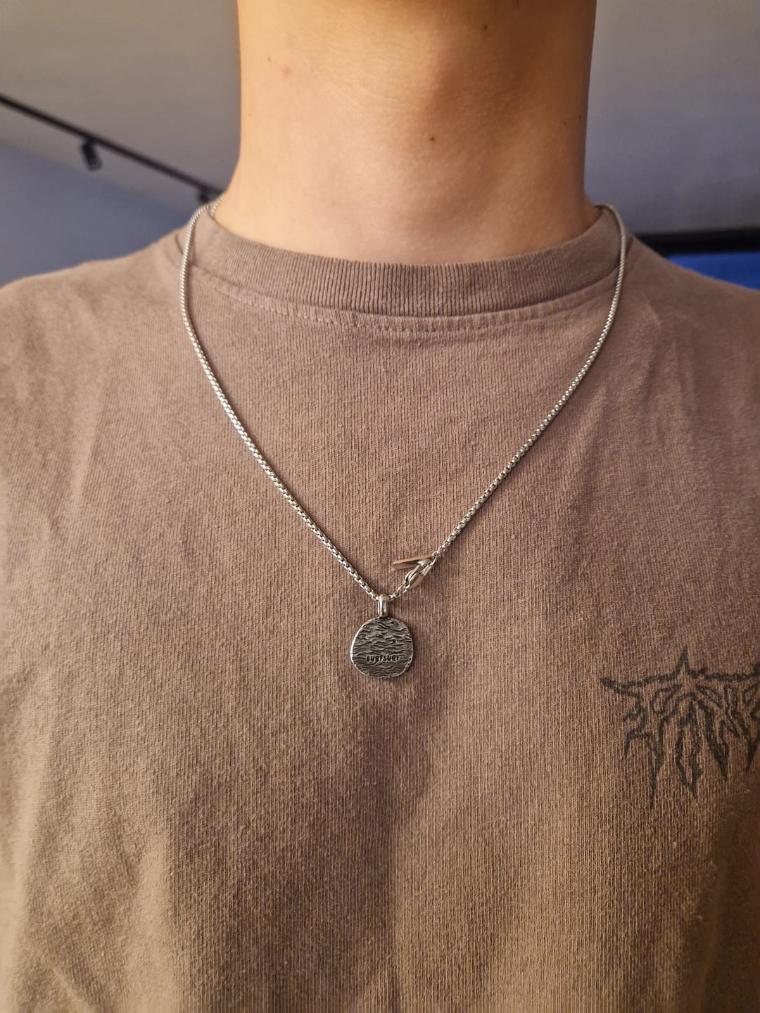 Customer photo review of Jeffreys Bay Wave Necklace