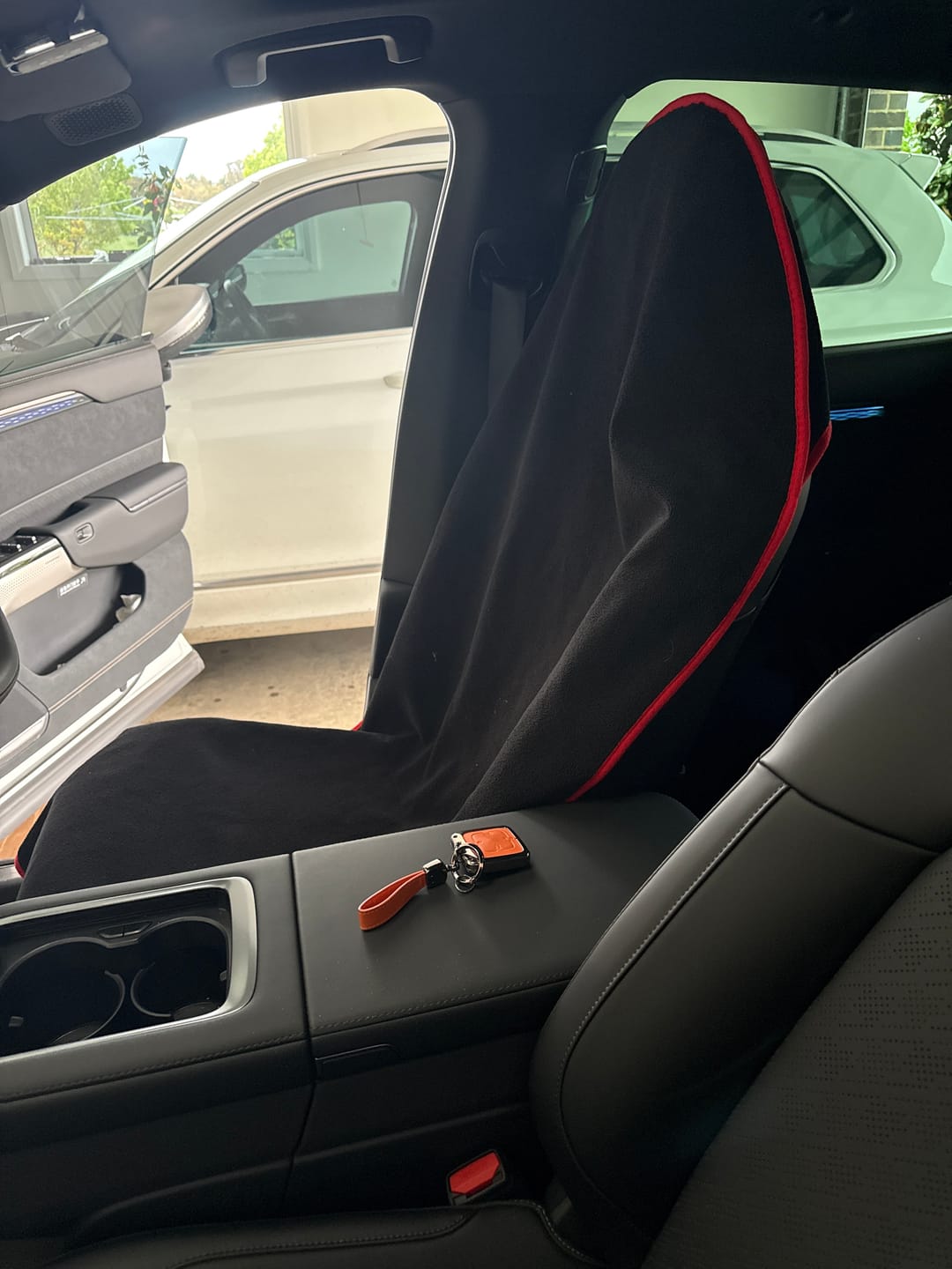 Customer photo review of Waterproof Car Seat Towel – Black Racing Red |  Towel Society