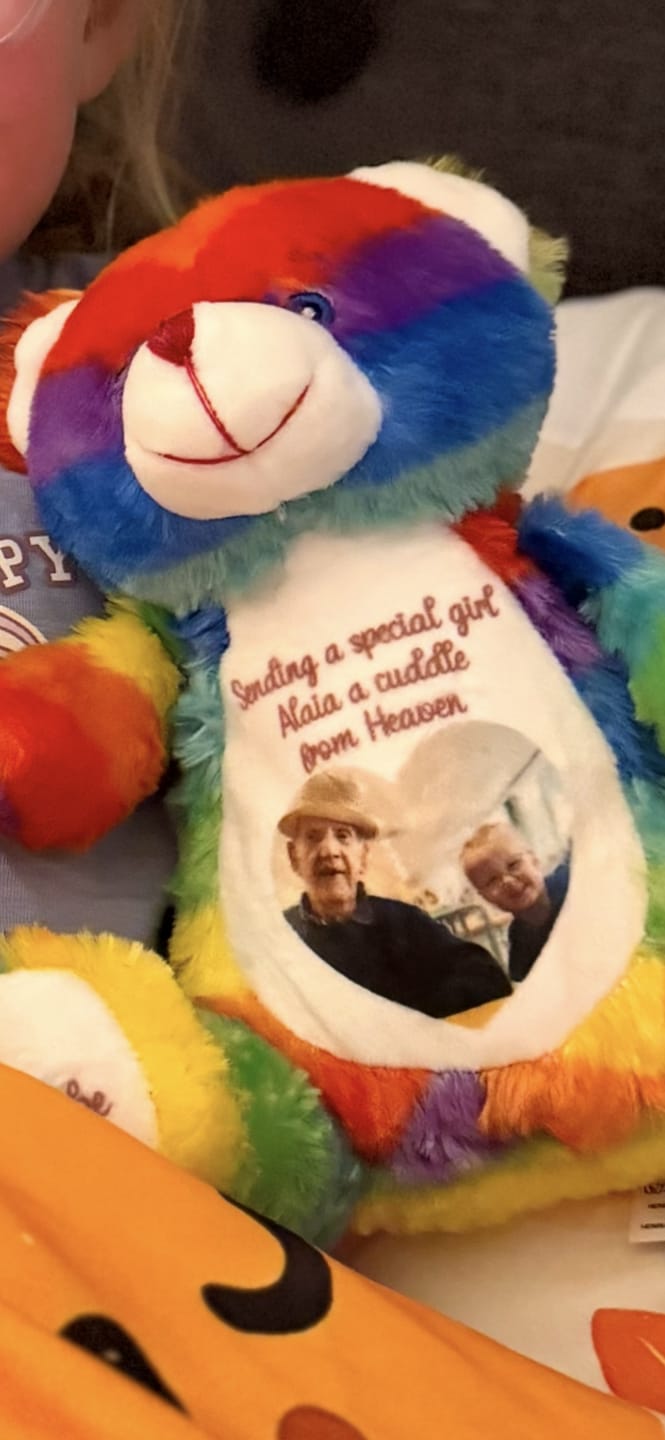Customer photo review of A Cuddle from Heaven Personalised Photo Teddy Bear