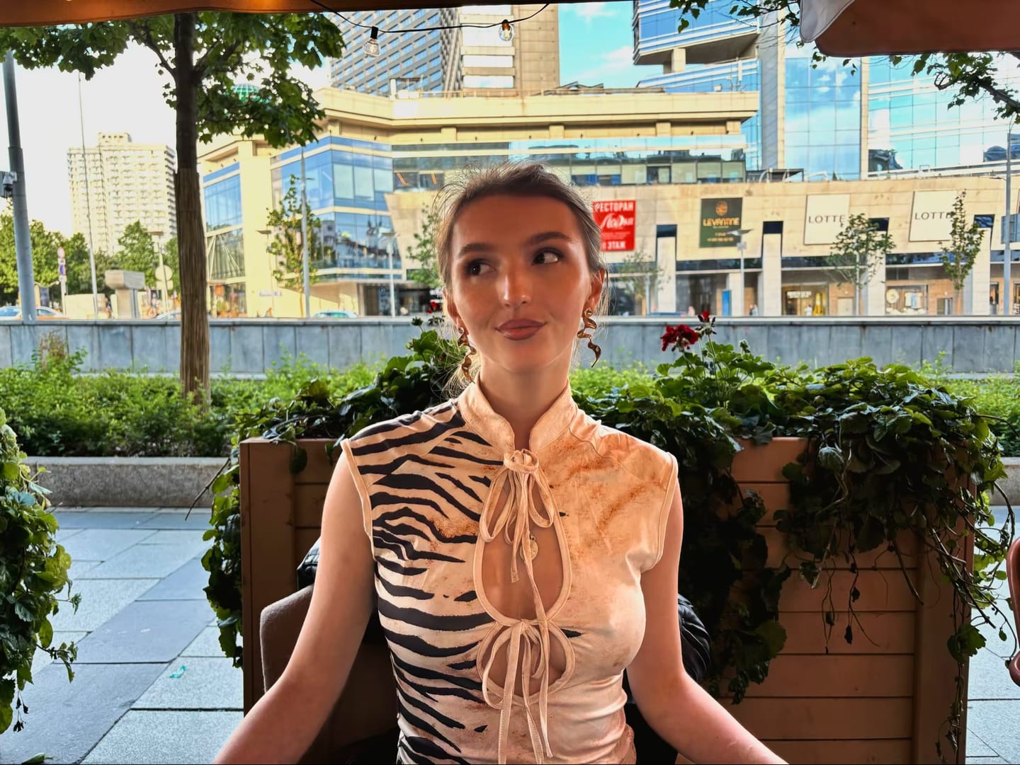 Customer photo review of Naïa Animal Print Cut-Out Top