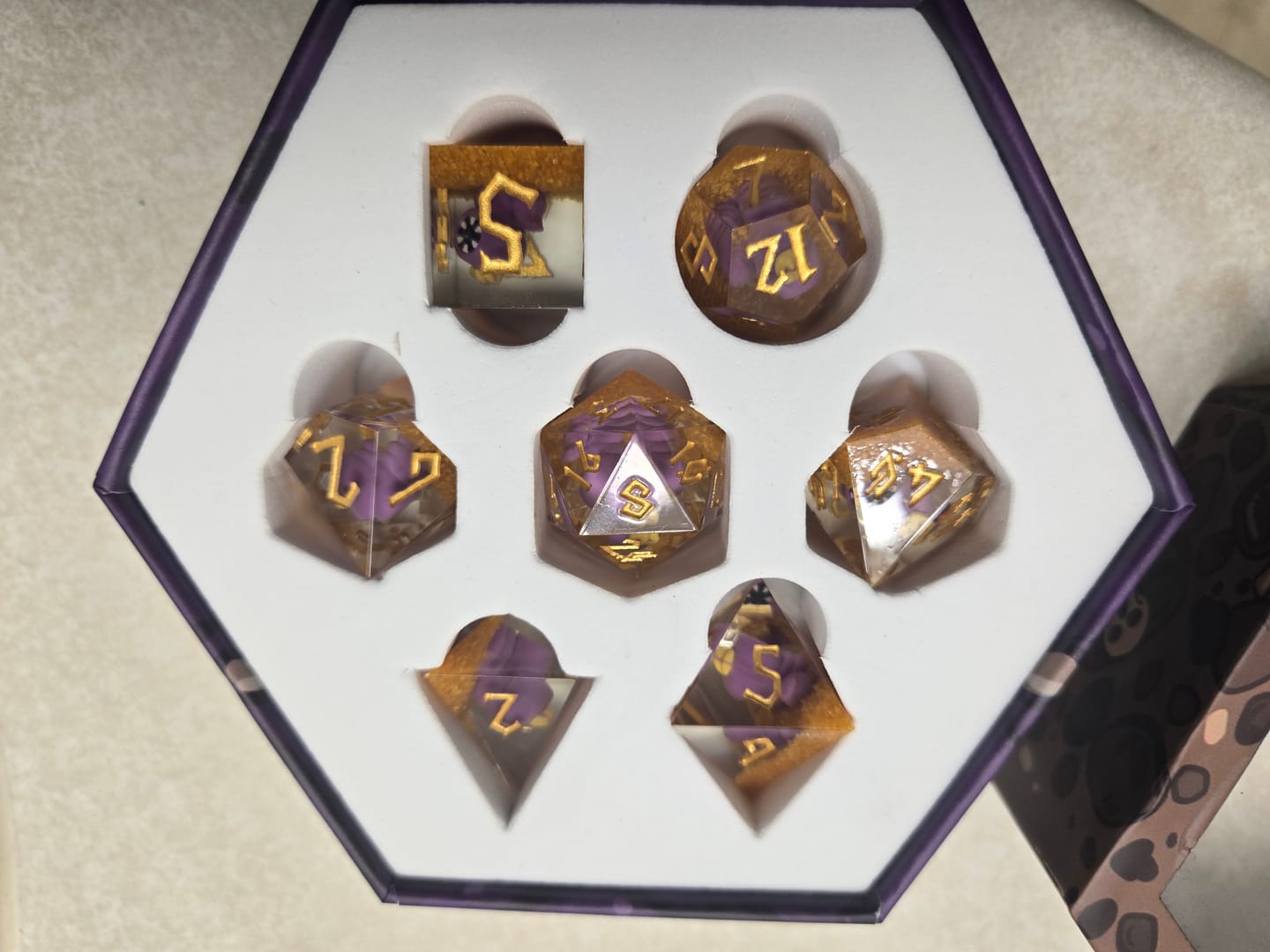 Customer photo review of PRE-ORDER || SMARSH Sharp-Edged Resin Dice Set | Tales From the Stinky Dragon x MMG