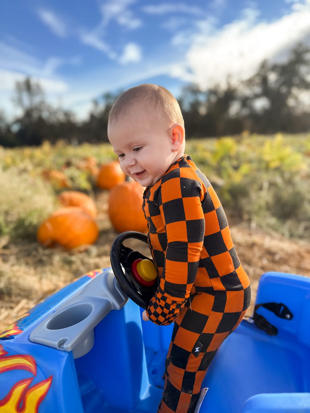 Customer photo review of Bamboo Zippy Sleeper in Jack-O Lantern Checkered