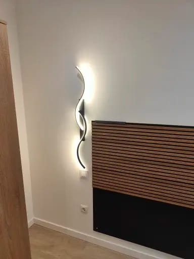Customer photo review of Curved LED Wall Light | Modern Indoor Wall Sconce for Bedroom, Living Room & Hallway | Dimmable Option