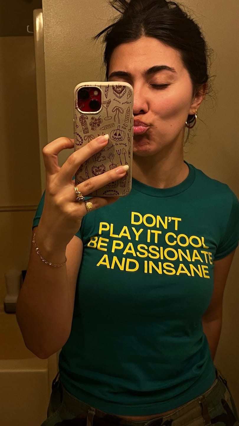 Customer photo review of Don't Play It Cool Be Passionate And Insane Baby Tee