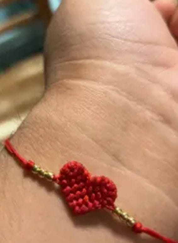 Customer photo review of Adjustable Red String Heart Bracelet, Handmade Woven Love Bracelet with Gold-Tone Beads, Matching Friendship Couple Bracelet for Women, Girls, Sisters & Best Friends