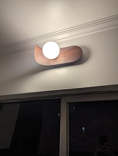 Customer photo review of Wood Wall Sconce | Minimalist Wood & Glass with G9 LED | 9.8 in Warm White for Living Room & Hallway