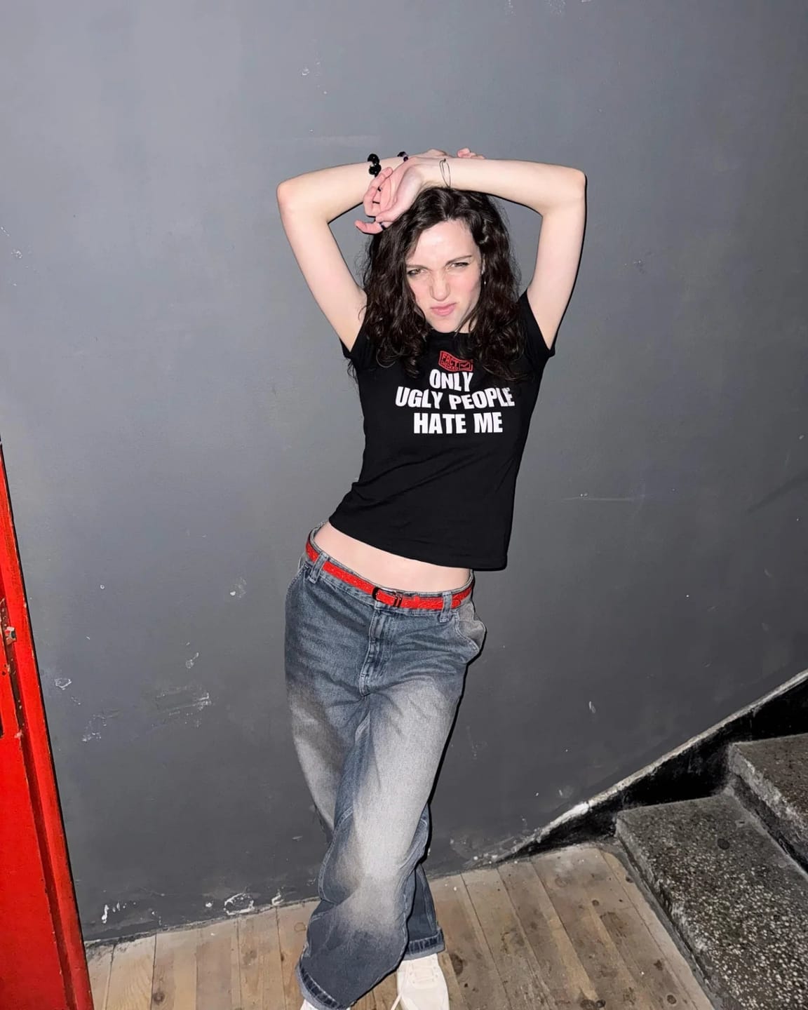 Customer photo review of Fact Checked Only Ugly People Hate Me Baby Tee