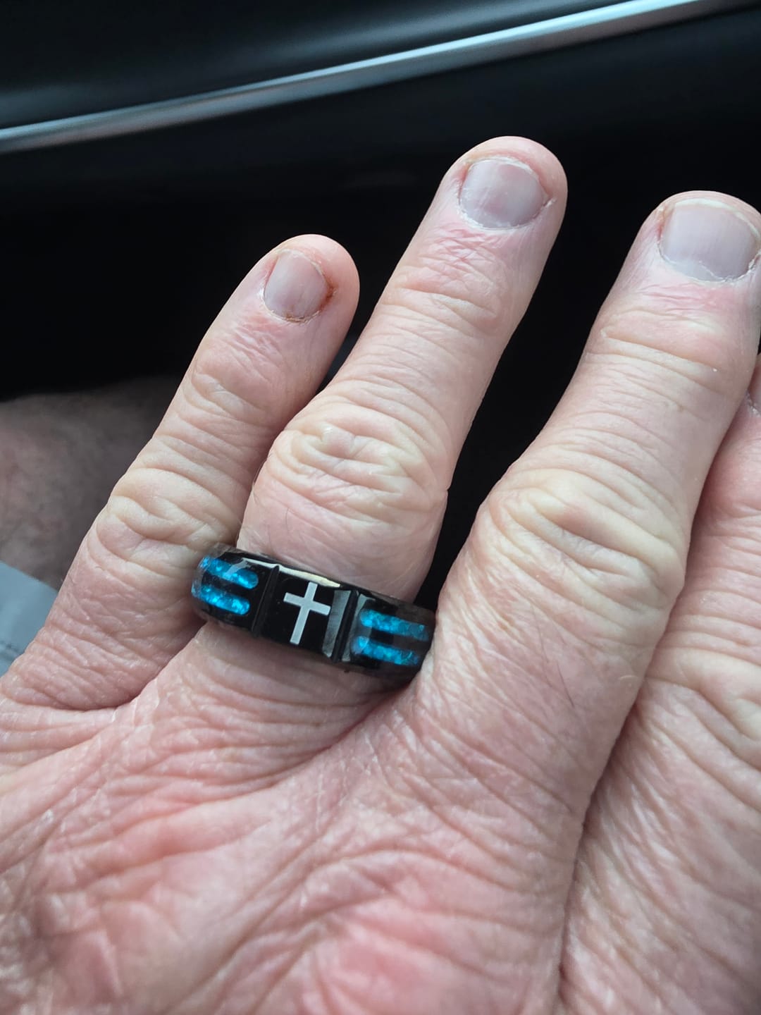 Customer photo review of Christianartworkshop Modern Titanium Steel Cross Ring with Laser Blue Inlay: Serenity in Christ's Blue Light