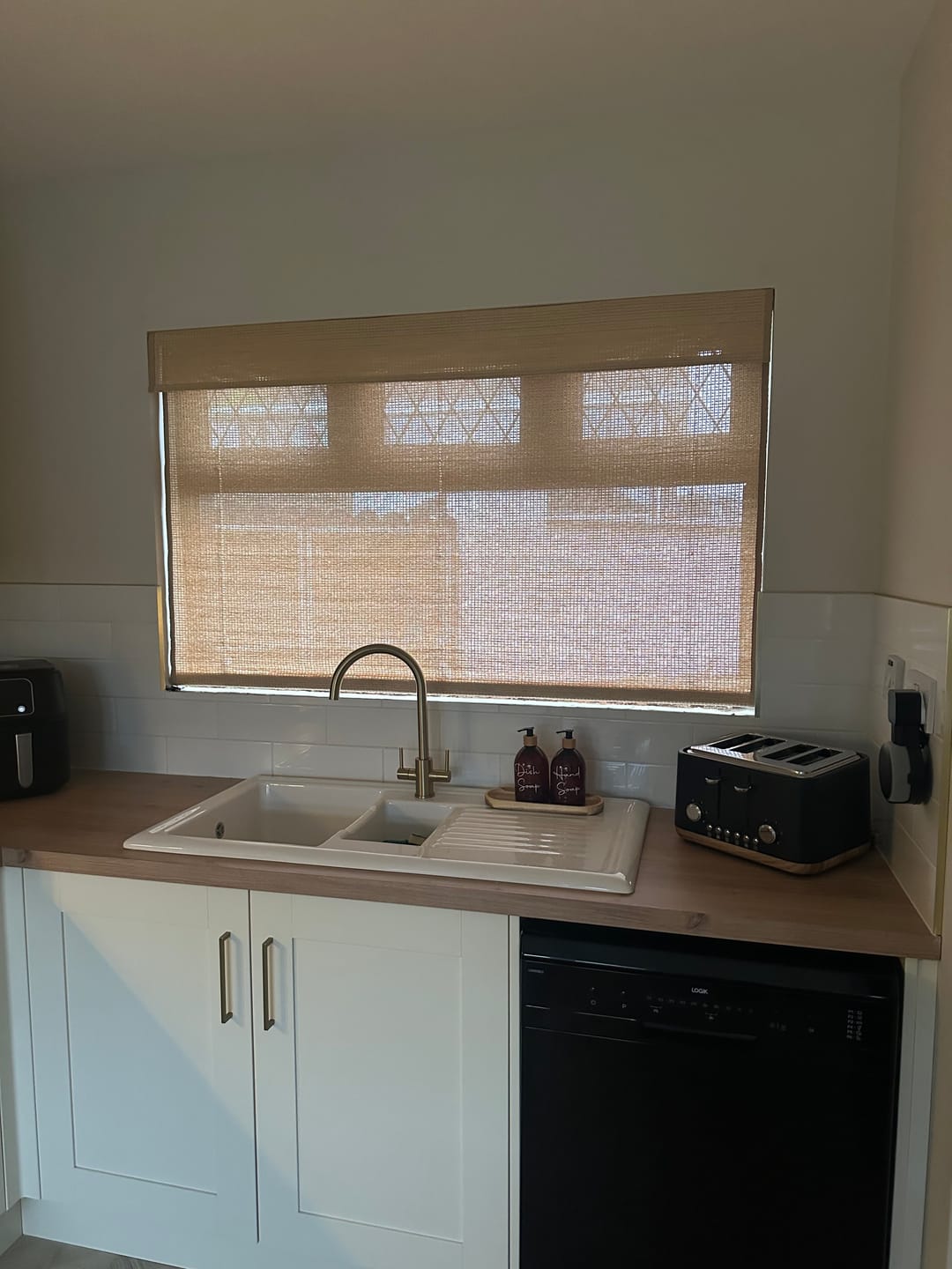 Customer photo review of Rattan Natural Bamboo Woven Wood Shades
