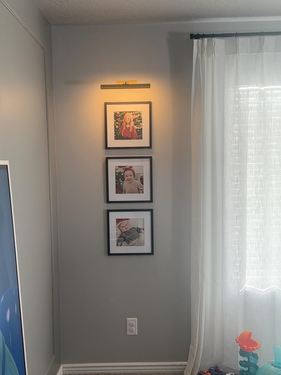 Customer photo review of Rechargeable Picture Light | Cordless LED Bar, Magnetic Mount, USB-C | Remote & Touch Dimming, Timer, Gold or Black