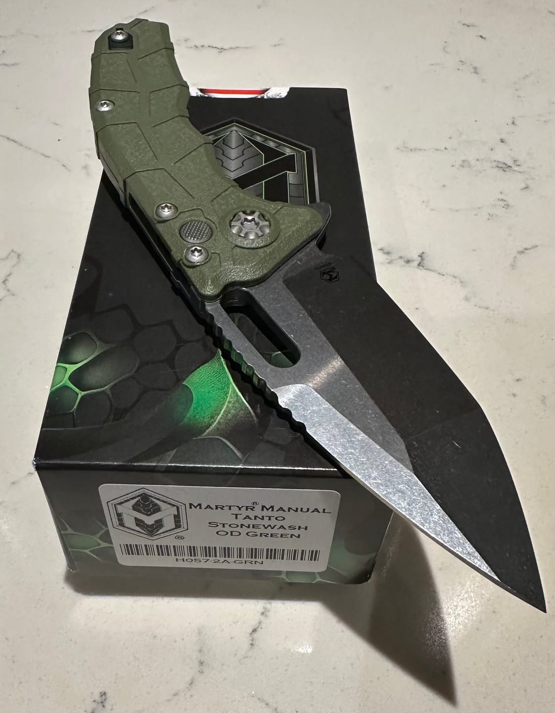 Customer photo review of Heretic Martyr Manual Tanto 3.4" MagnaCut Stonewash, OD Green Polymer Chassis - Made in USA (H057-2A-GRN)