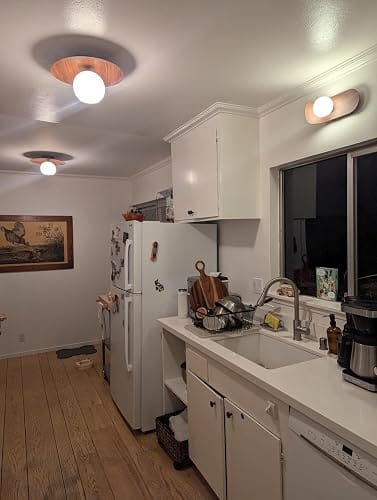 Customer photo review of Wood Wall Sconce | Minimalist Wood & Glass with G9 LED | 9.8 in Warm White for Living Room & Hallway