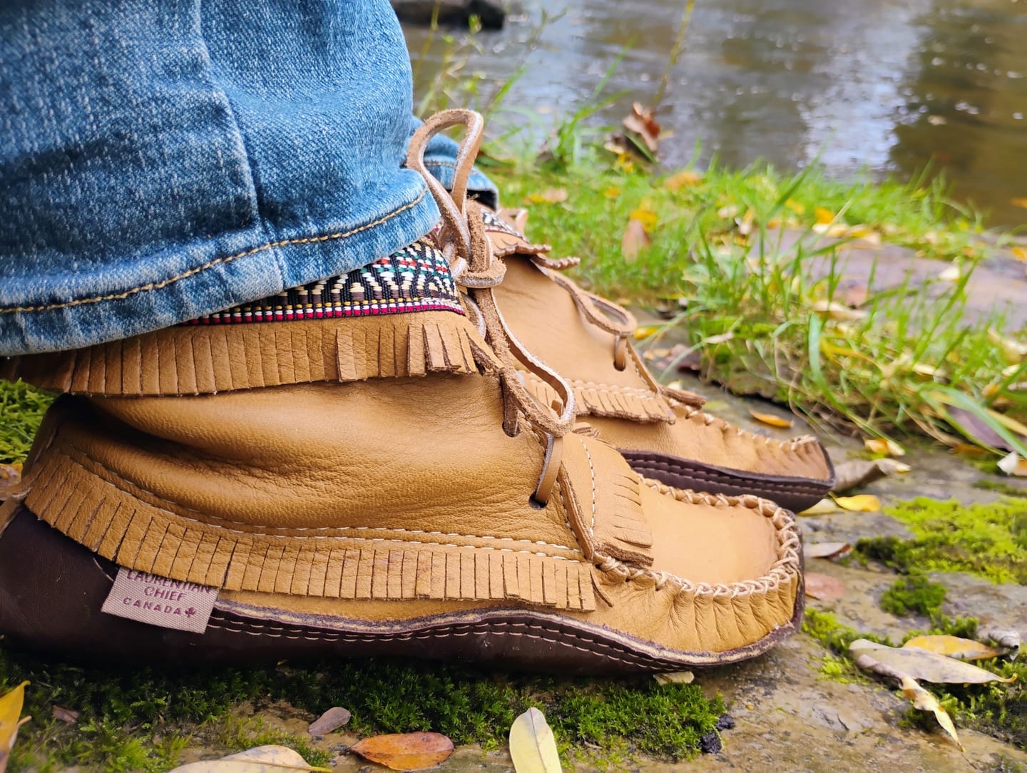 Beth's customer photo of women's fringed leather moccasin boots worn outdoors