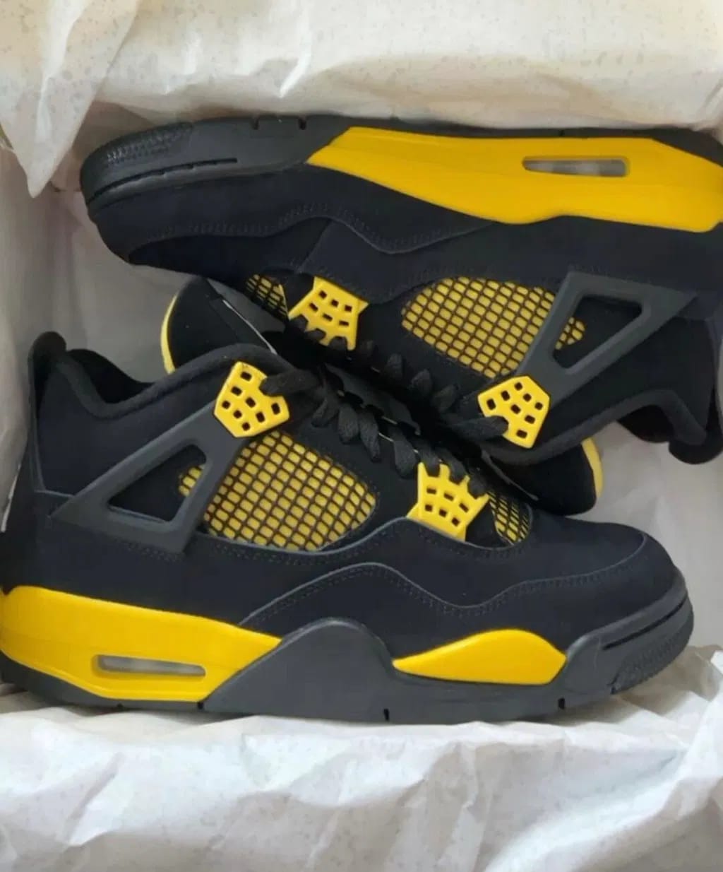 Customer photo review of Air Jordan 4 Retro “Thunder”